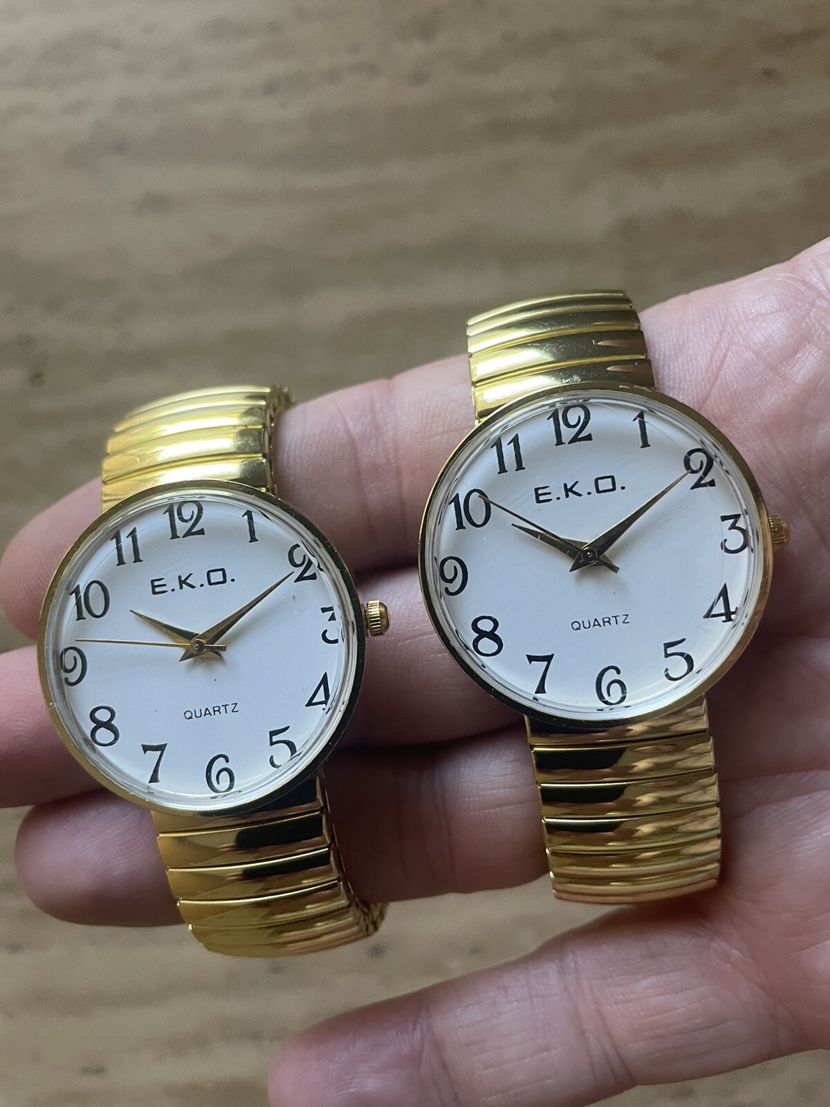 Buyer Gets 2 Unisex stretch Gold quartz Watches with LARGE EASY TO READ NUMBERS