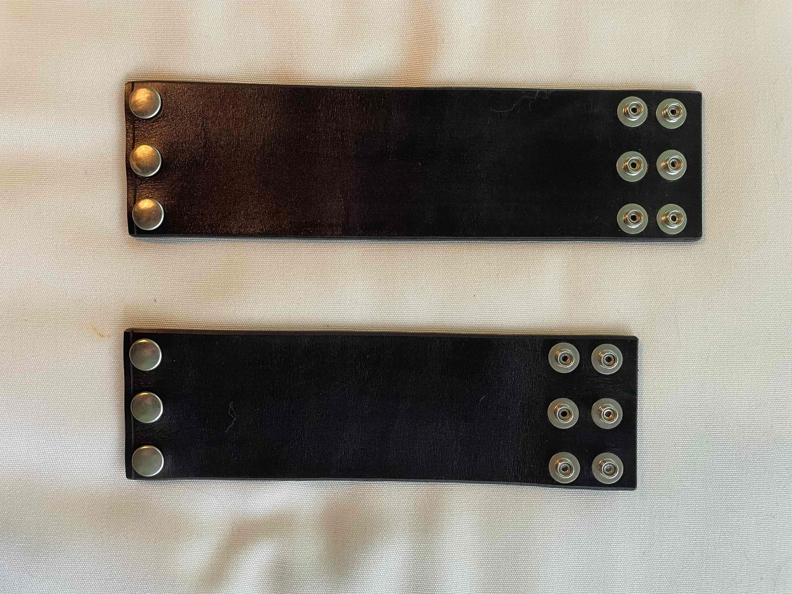 Black leather wrist bands size M & L never worn