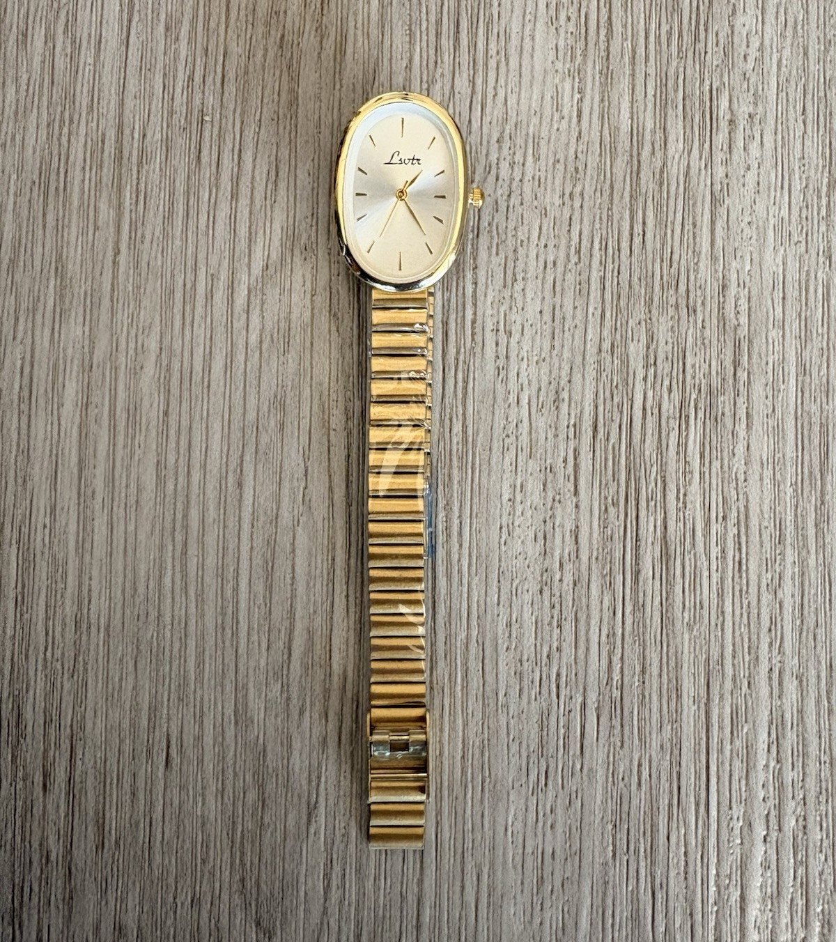 Loris Women’s Quartz Oval Dress Watch White Dial Gold Tone Bracelet