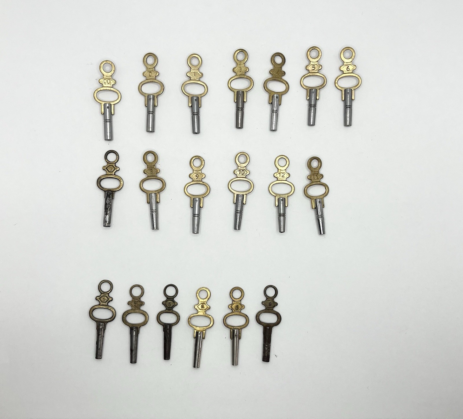 Job lot of pocket watch keys almost full set (missing No4) plus extras steampunk