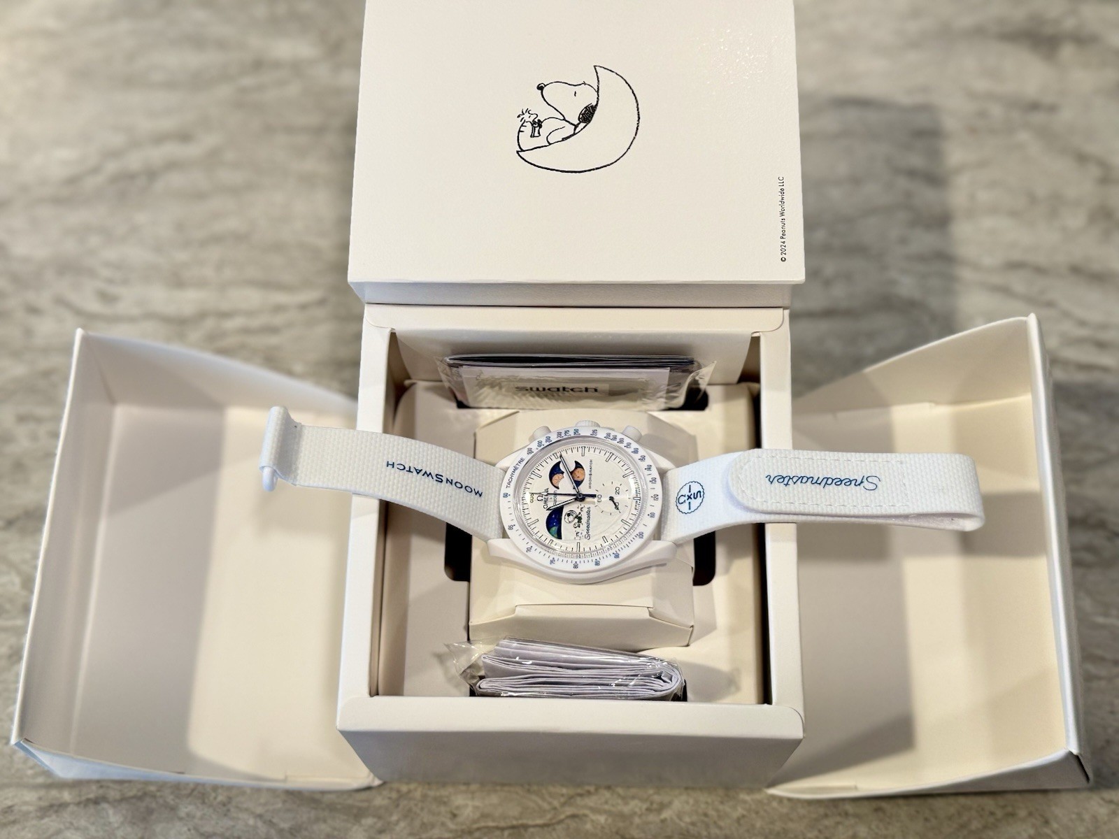 Omega x Swatch MoonSwatch “Moonphase Snoopy” – White Edition