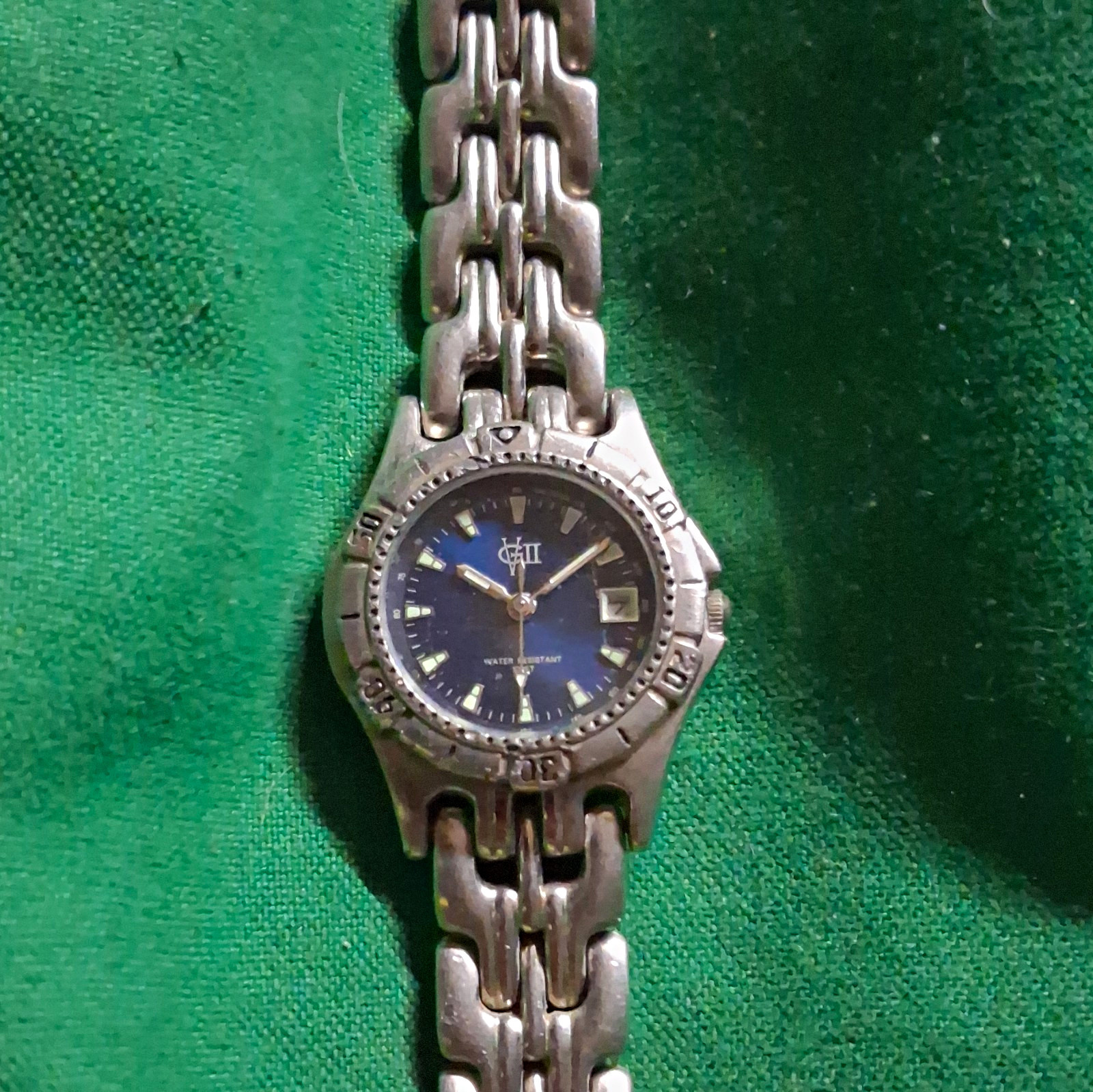 Women’s Analog Wristwatch Blue Dial Date Silver Tone Metal Bracelet Round