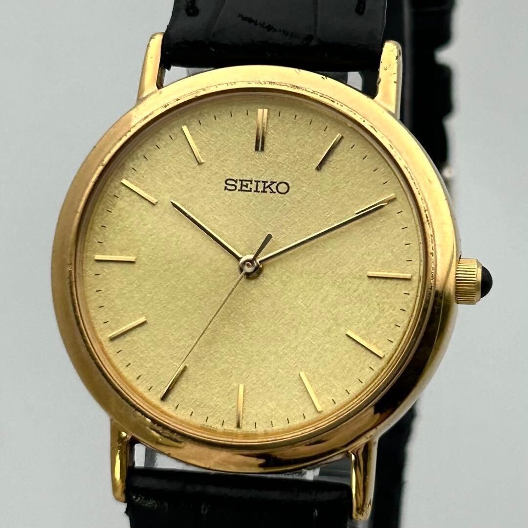 SEIKO 7N01-6900 Vintage Mens Quartz Watch Gold Dial Japan Minimal 31.7mm RARE