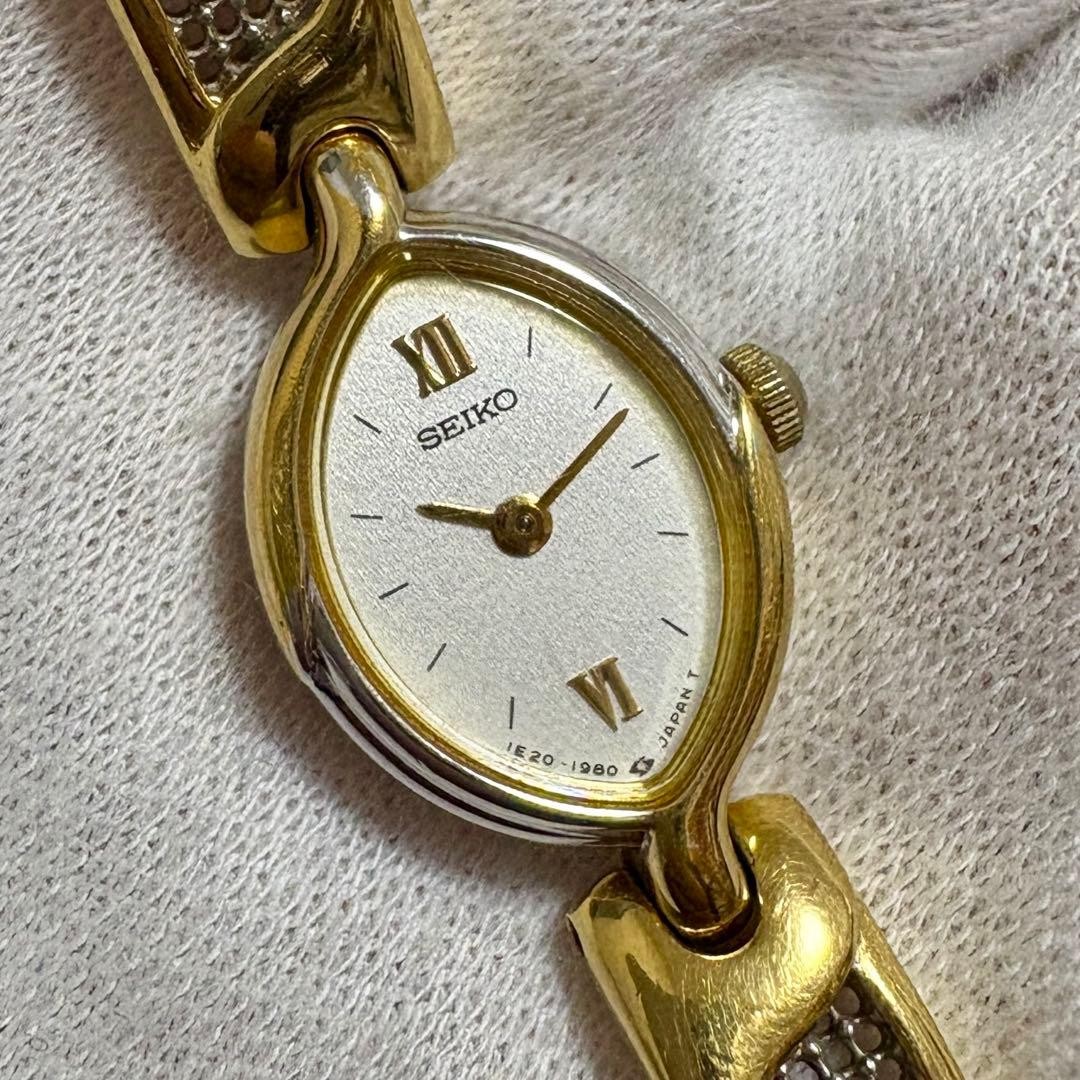 Vintage Seiko 1E20-6120 Ladies Quartz Bangle Watch Oval Roman Dial Two-Tone