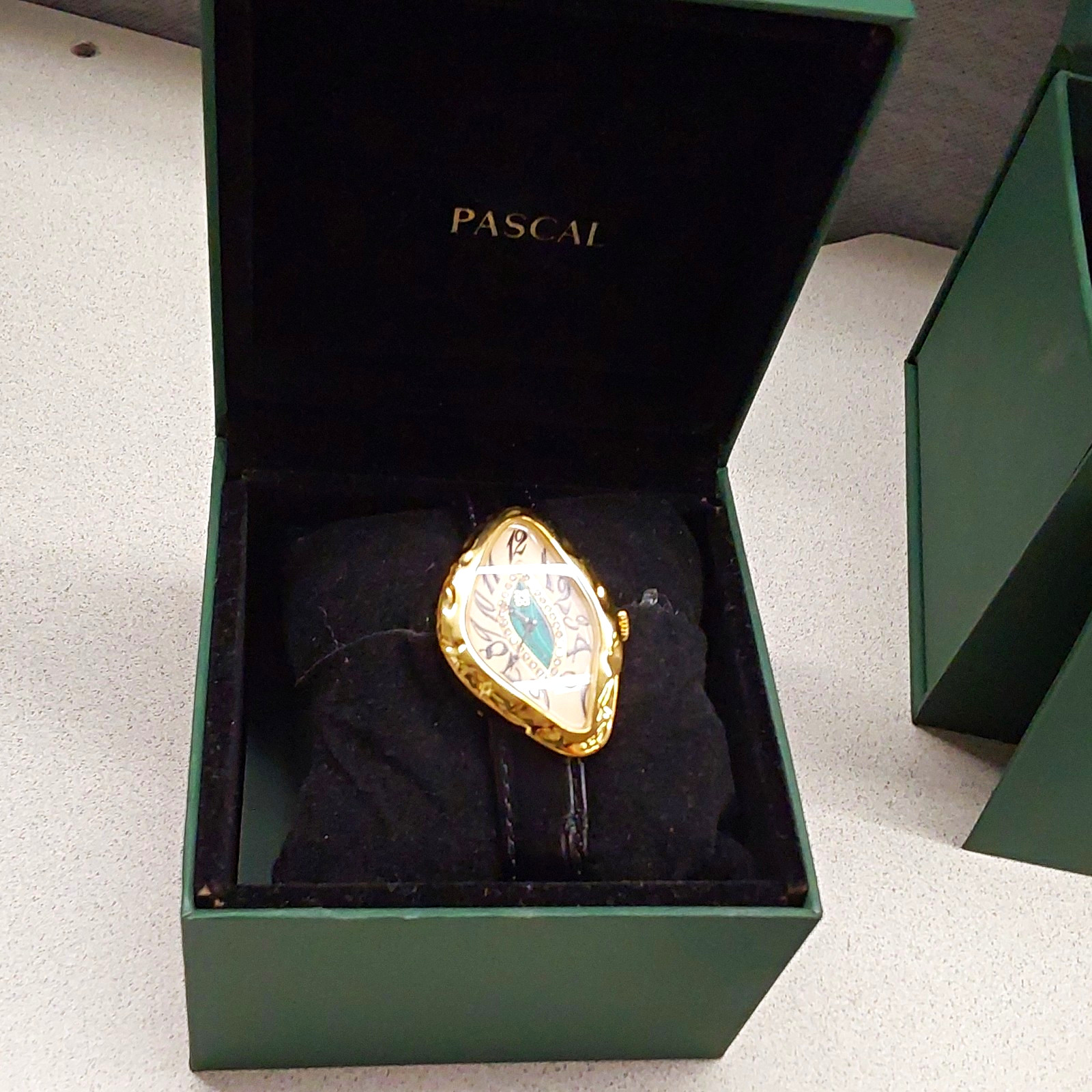 Pascal Paradoxe Women’s Quartz Oval Gold Tone Black Leather Watch