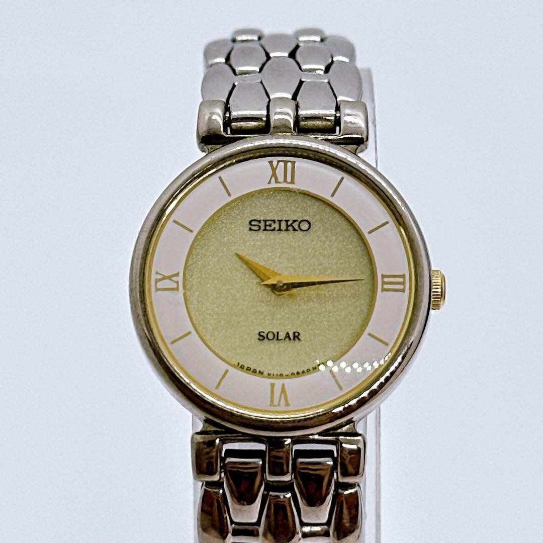 Seiko women’s solar-powered watch, gold and silver color, working condition