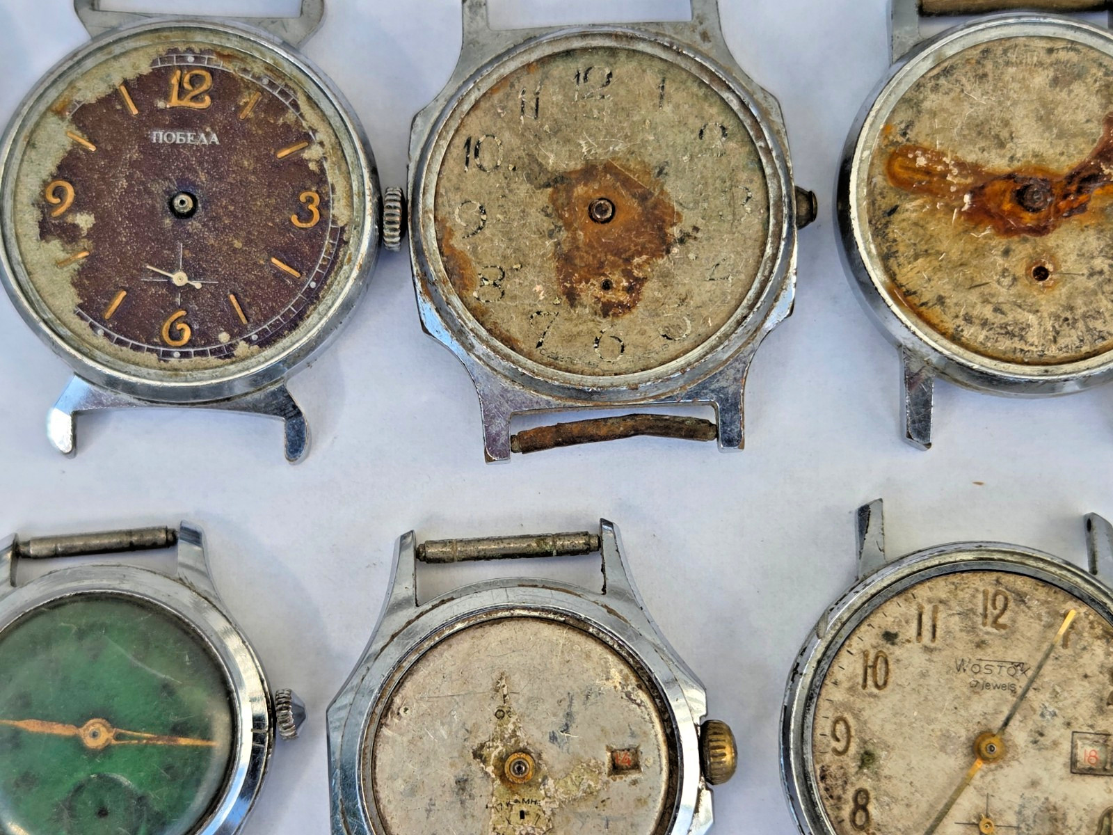 Lot of 75 Russian Watches Vostok Pobeda Mayak Zim etc Not working for parts Read
