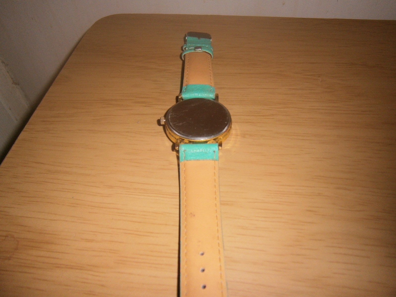 Late 2000’s green leather ‘Geneva Platinum’ ladies quartz watch.23.7cm(E24WB)